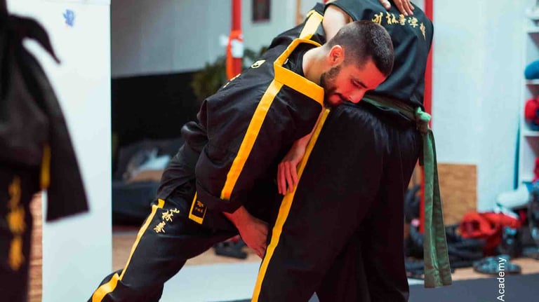 a man in a black suit and a man in a yellow jacket