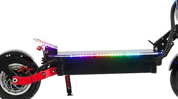 a scooter with a colorful light up