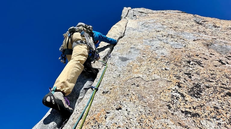 Hand jamming on Spigolo Vinci, Pizzo Cengalo. Valmasino, Italy