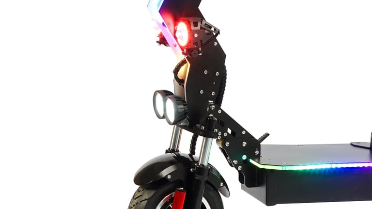 a scooter with a colorful colored lights on it