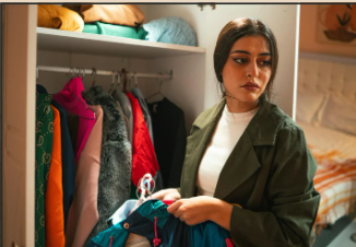 overwhelmed homeowner unsure how to start decluttering a closet