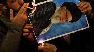iransupremeleaderphotosetonfirelightingcigarrette