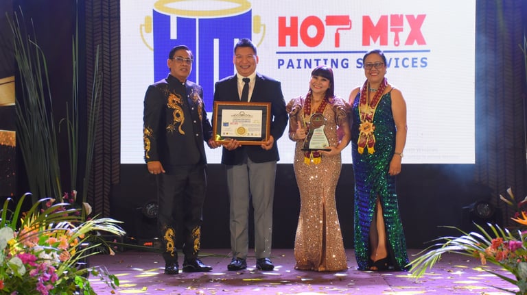 Hotmix Painting Services receiving Lifetime Achievement Award at Manila Hotel Grand Ballroom