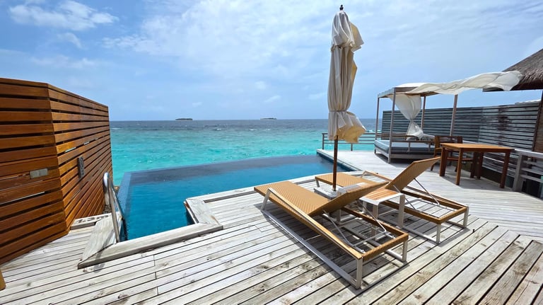 Baros Maldives overewater pool villa terrace