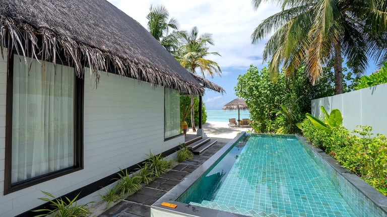 Ozen Life Maadhoo Maldives beach earth villa with pool