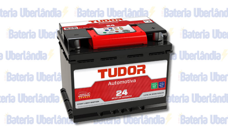 Bateria Tudor vermelha e branca com garantia de 24 meses, sobre fundo "Bateria Uberlândia".