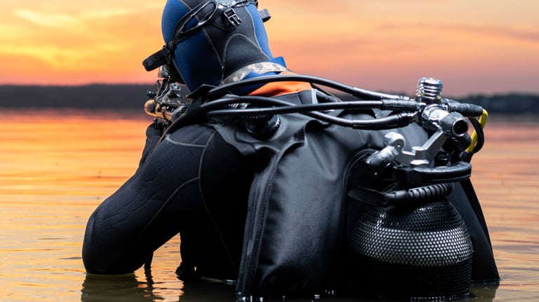 a person in a wetsuit with a scuba suit