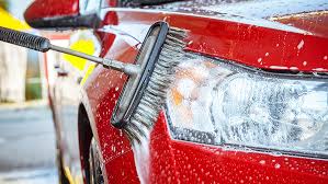 IMAGE MONTRANT LE SERVICE DU LAVAGE COMPLET CHEZ AUTOCRAZE 229