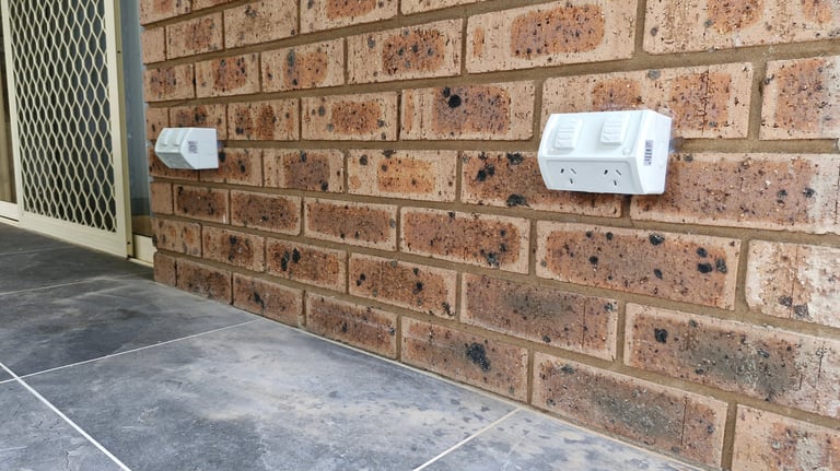 a close up of two outdoor powerpoints