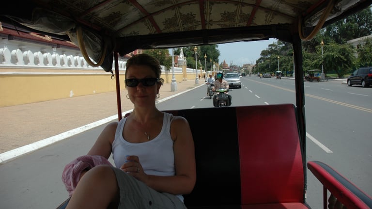 Tracey Billington in a tuk tuk in phnom penh, Cambodia