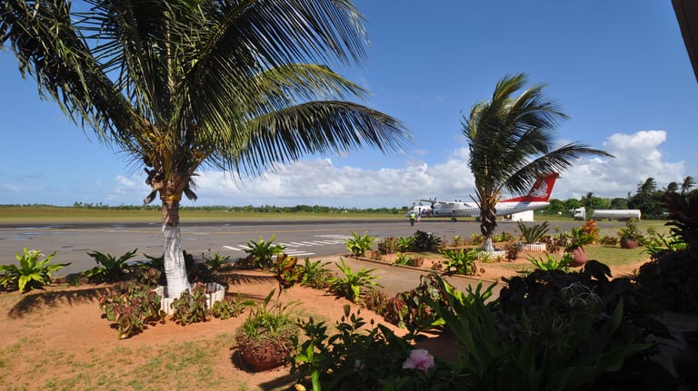 LAM airlines plane landing at Inhambane airport, Mozambique