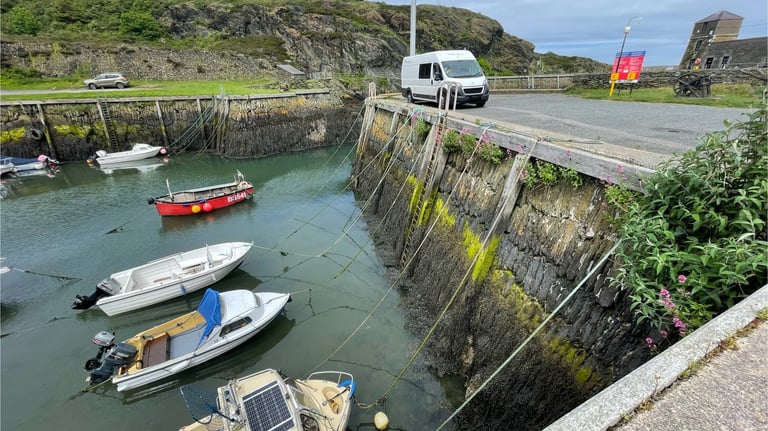 Nick and Tracey Billington camper at the harbour in Port Amlwch