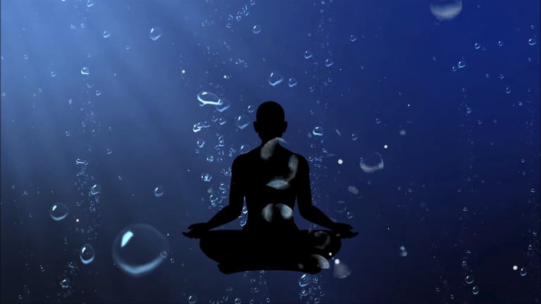 Silhouette of meditation figure deep underwater with bubbles rising