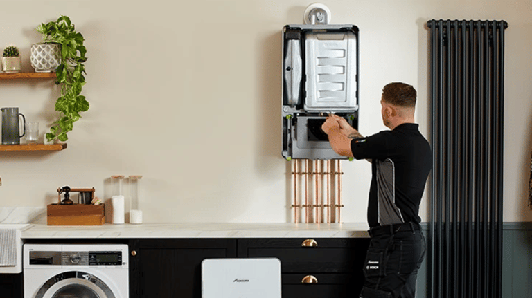 Technician performing a boiler service on a Worcester Bosch boiler, ensuring safety and efficiency