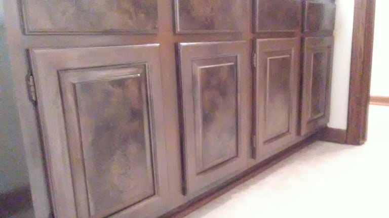 Custom painted faux marble bathroom cabinets and drawers