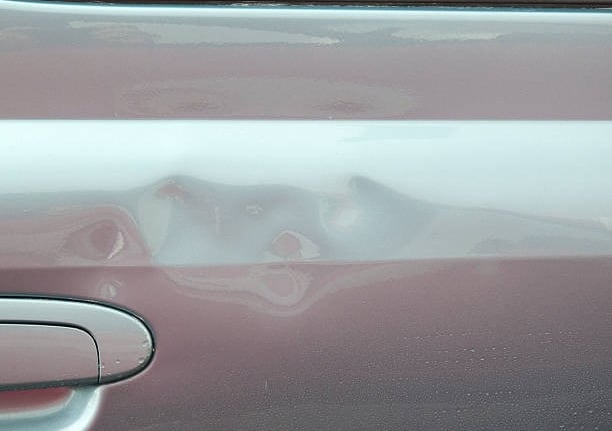 Door ding repair using PDR effectively fixes dents in 2-3 hours, restoring without repainting.