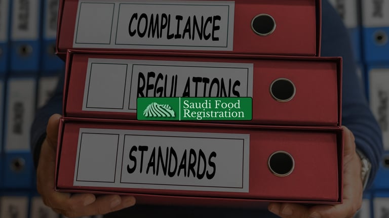 Red folders labeled compliance, regulations, and standards representing SFDA compliance documentation.
