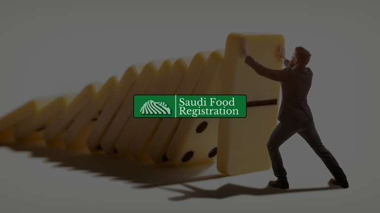 Businessman stopping falling dominos, symbolizing crisis management for SFDA compliance challenges in Saudi Arabia.