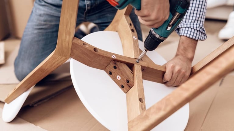Turnover Fix & Shine tech assembling a table.