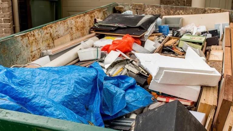 Team Turnover Fix & Shine hauling away tenant move-out debris and trash, maintaining cleanliness.