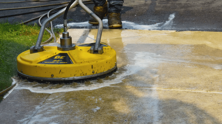Pressure washer from Turnover Fix & Shine cleaning a driveway. 