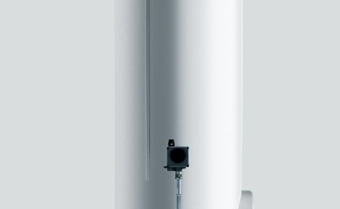 a white tankless water heater with a black top