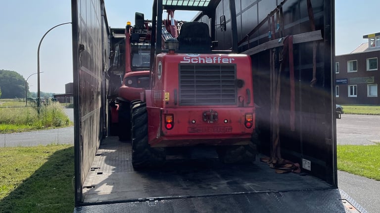 Transport Radlader mit Tiefbett