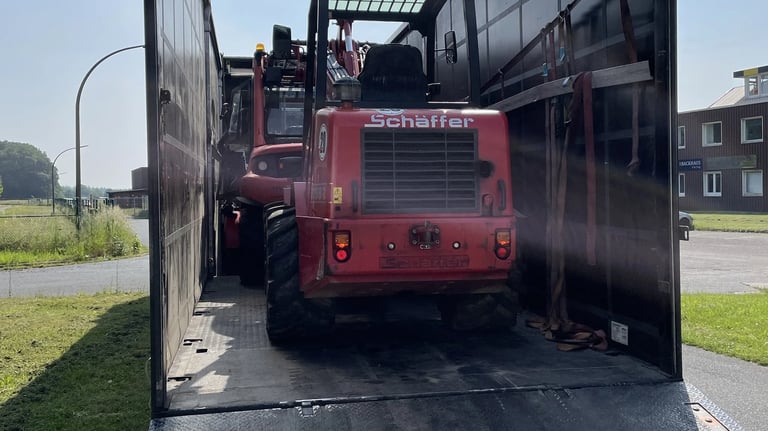 Transport Radlader mit Tiefbett