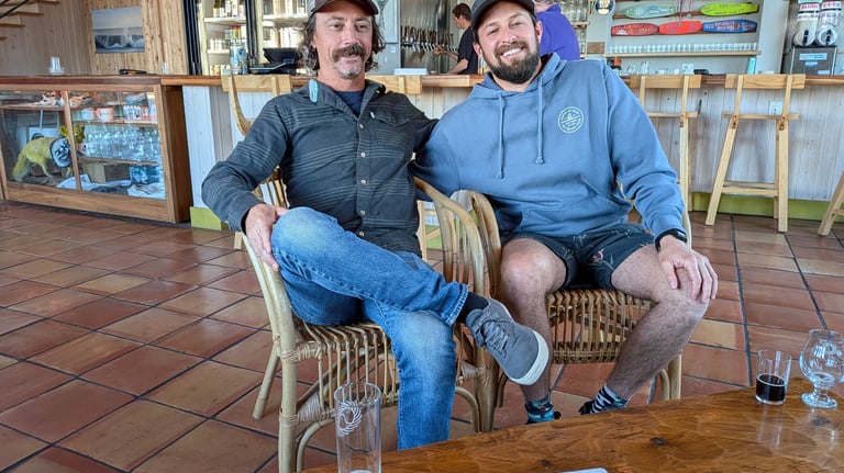 Brad Fitzgerald seated next to brewer Mike Swartz, Swells a Brewing