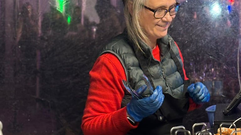 Friendly staff serving food at wedding
