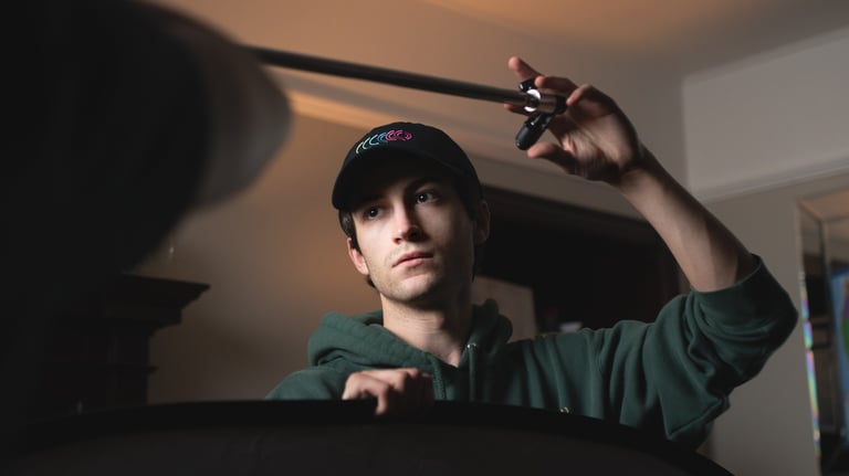 Film production services: person in a green shirt and baseball cap