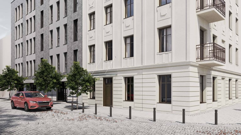 zrewitalizowany budynek kamienicy na ul. Składowej w Łodzi z nowoczesną częscią mieszklaną z szarej 