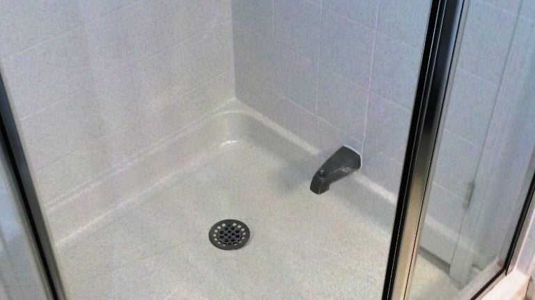 Shower tiles resurfaced to a bright clean finish