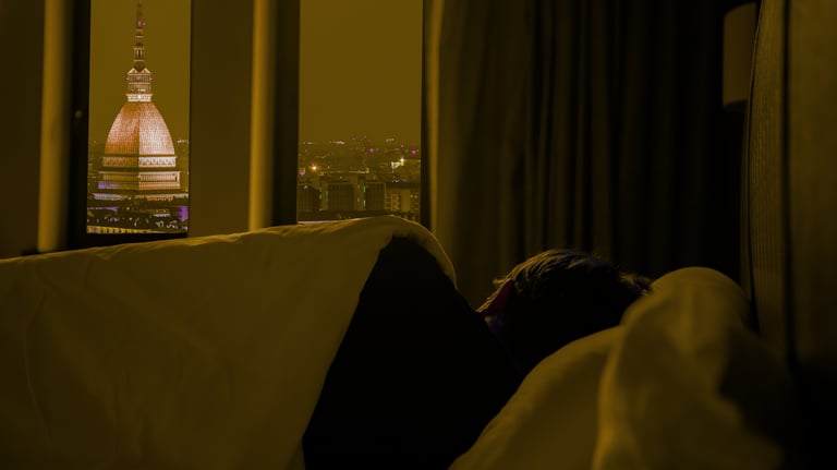 A person sleeping peacefully in cozy bedroom night sky– deep sleep self-care and wellness healing.