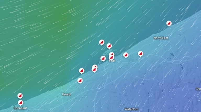 Screenshot of the Windfinder app displaying wind speed, direction, and forecast data 