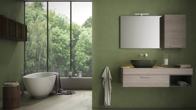 Modern green bathroom featuring a floating wood vanity, vessel sink, and freestanding bathtub by a window.