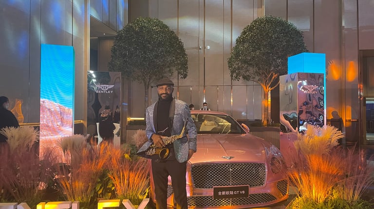 Luxury corporate event with professional saxophonist performing for glamorous London gathering