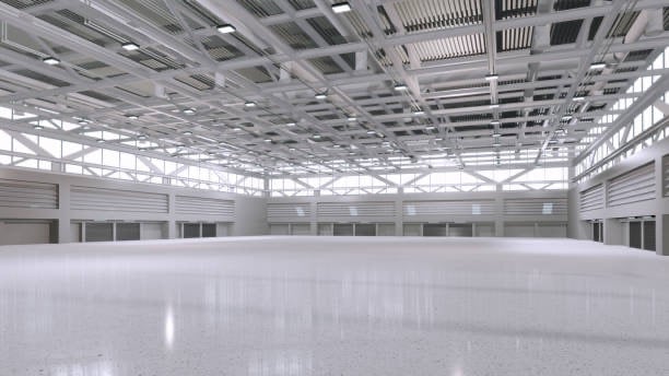 Pintor industrial trabajando en pabellón de polígono en Bizkaia