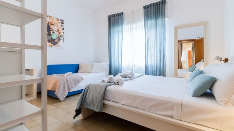 Casa Rava Sul Parco Camera da letto