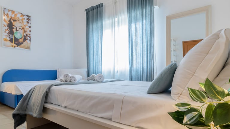 Casa Rava Sul Parco Camera da letto