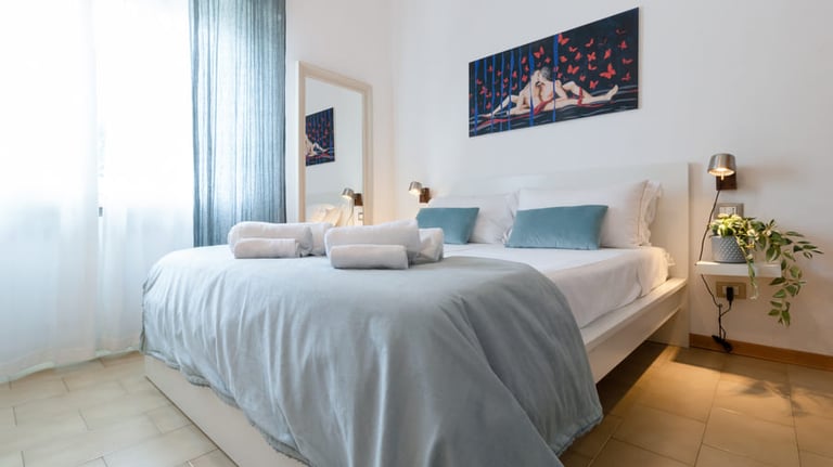 Casa Rava Sul Parco Camera da letto