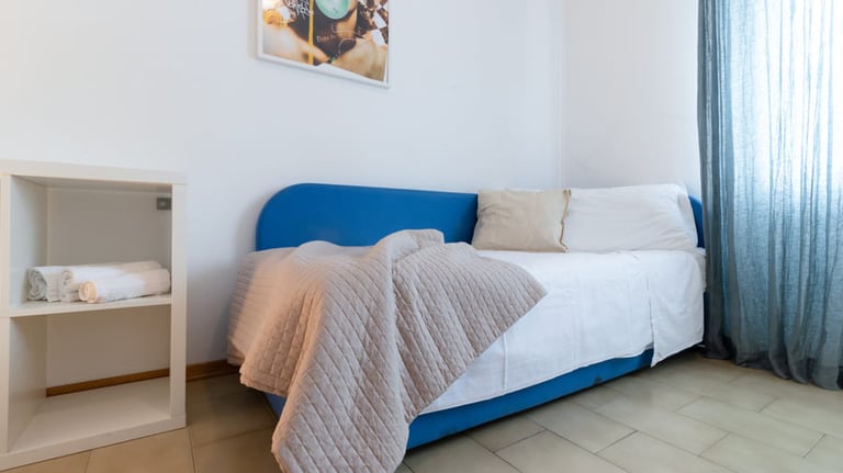 Casa Rava Sul Parco Camera da letto