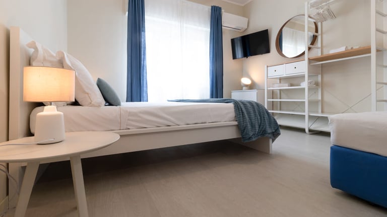 Casa Rava Sul Parco Camera da letto