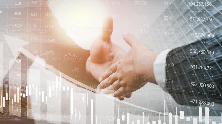 Business professionals shaking hands overlayed with a stock market financial growth chart and data.