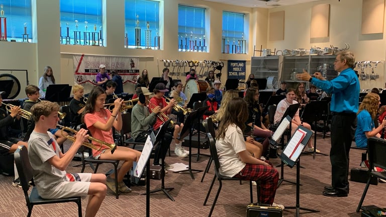 Concert Band Director in rehearsal.