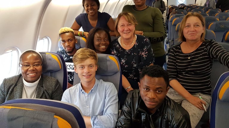Missionary sisters and volunteers traveling together for outreach mission