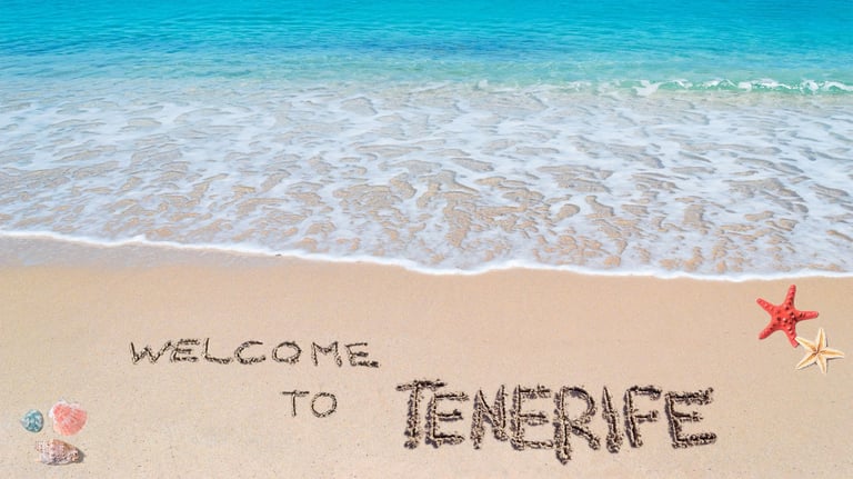 foto de boas vindas na areia em tenerife