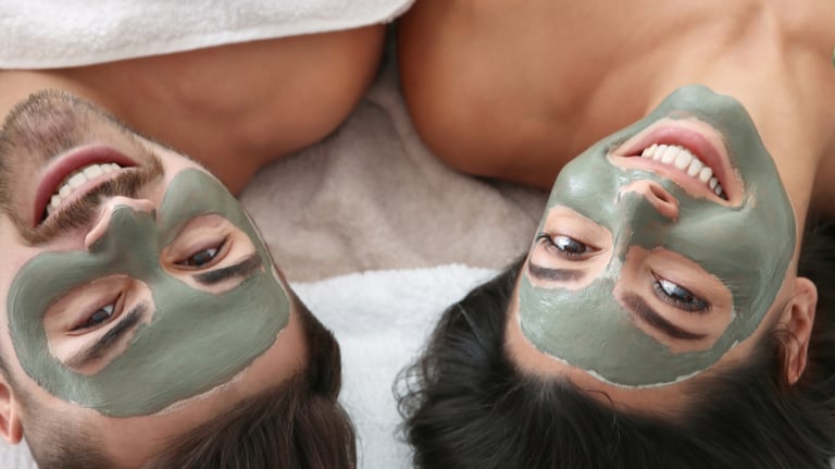 couple with facial mask treatment