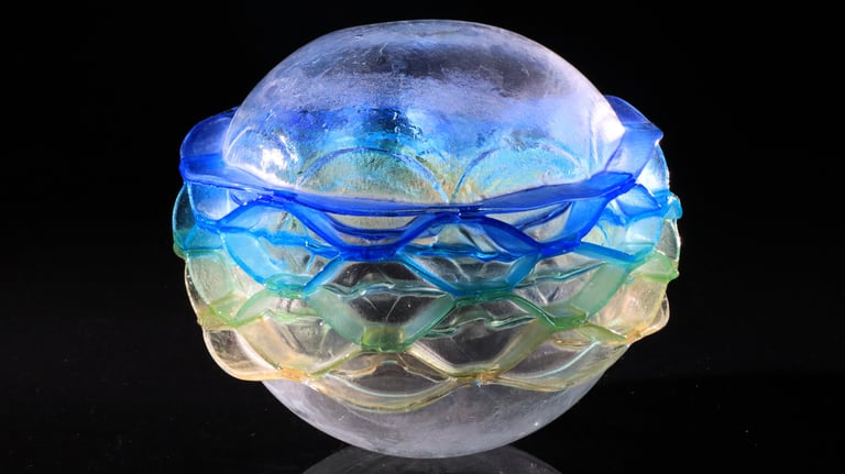 organic glass art made by inflating sheets of glass