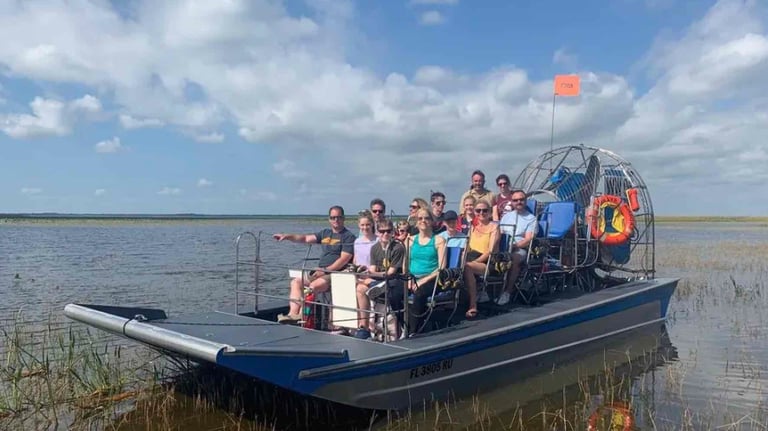a group of people on an air boat in Florida lake